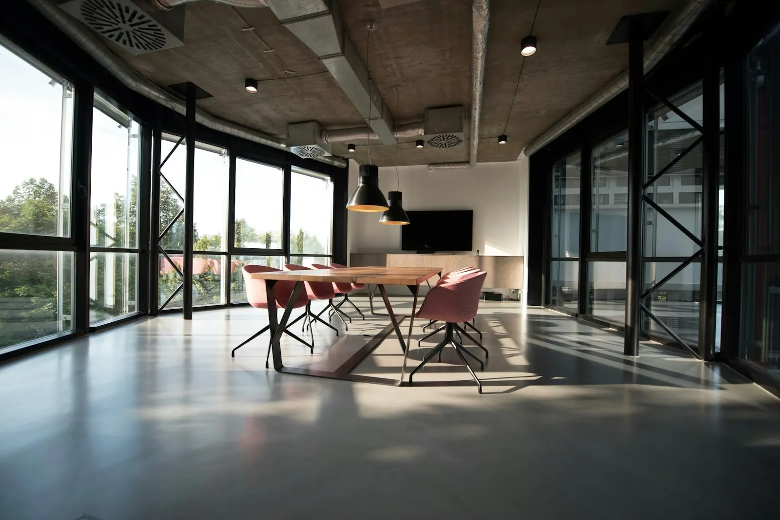 A bright, open office with a meeting table